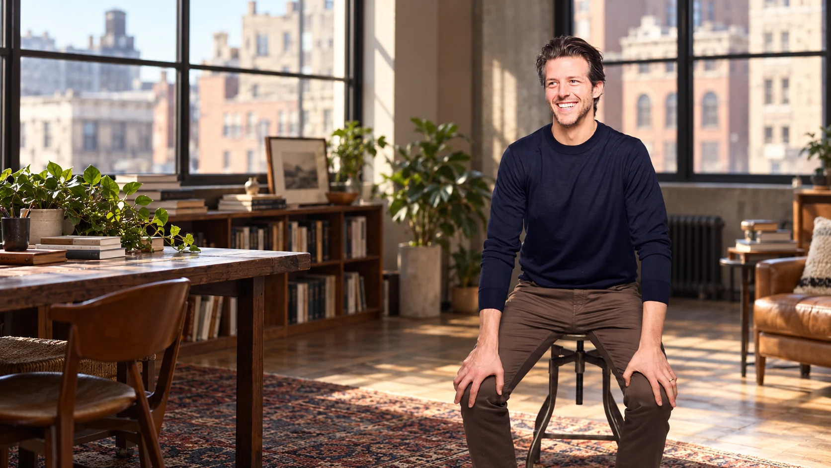 Jason Martuscello, seated and smiling